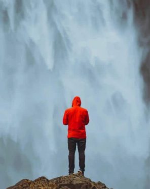 Man watching waterfall paint By Numbers